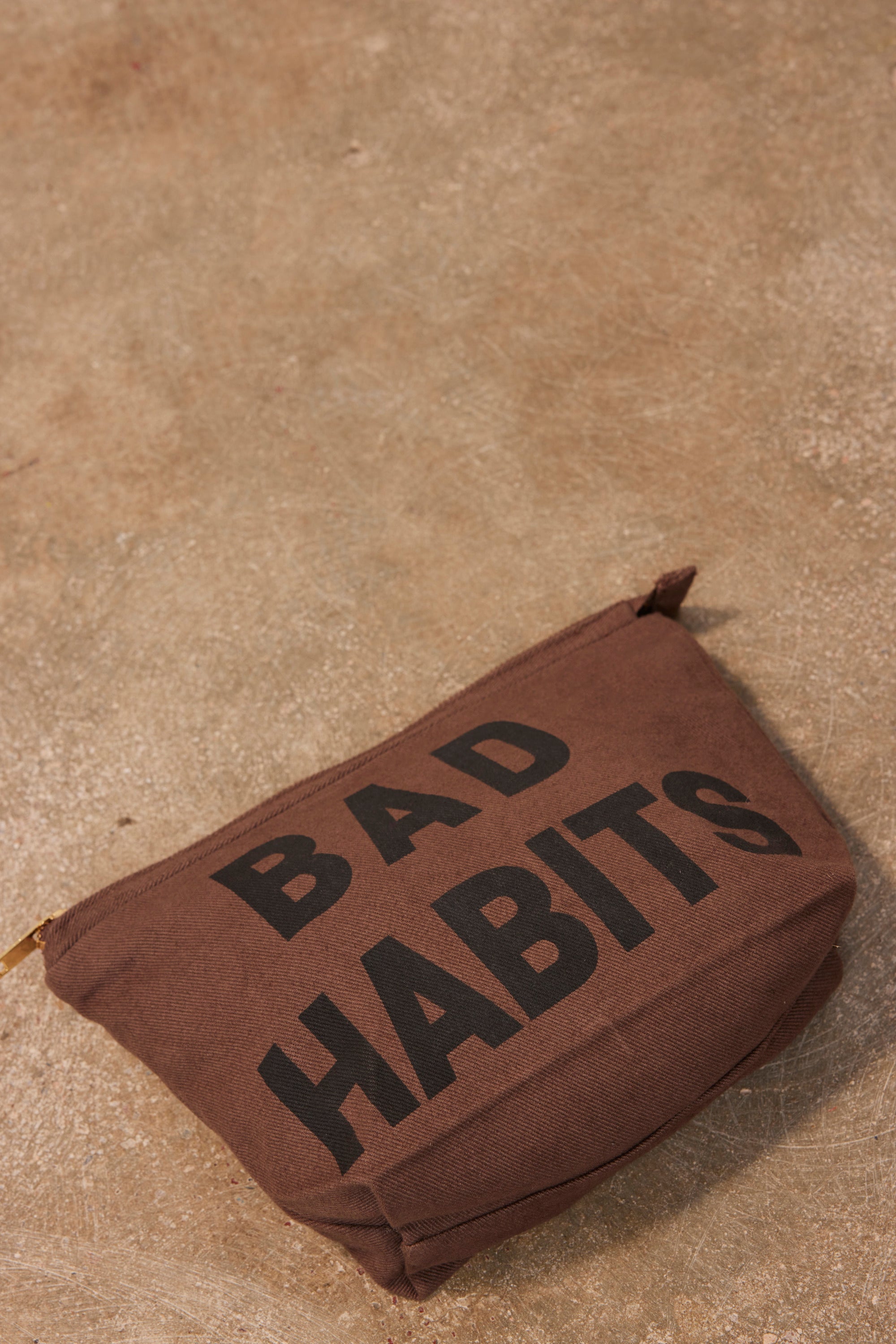 BAD TAUPE TOILETRY BAG