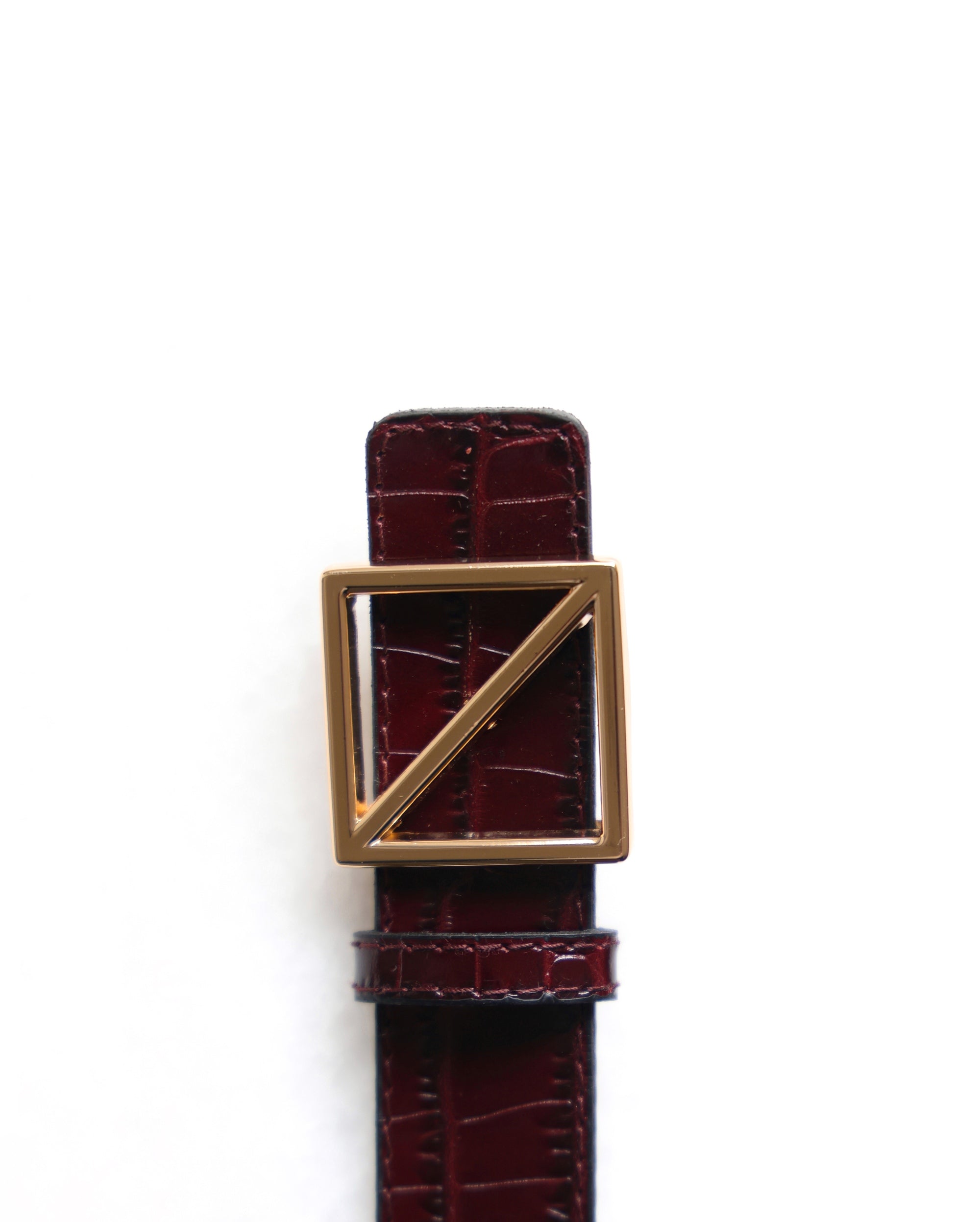 CINTURÓN COCO PIEL BURDEOS DORADO