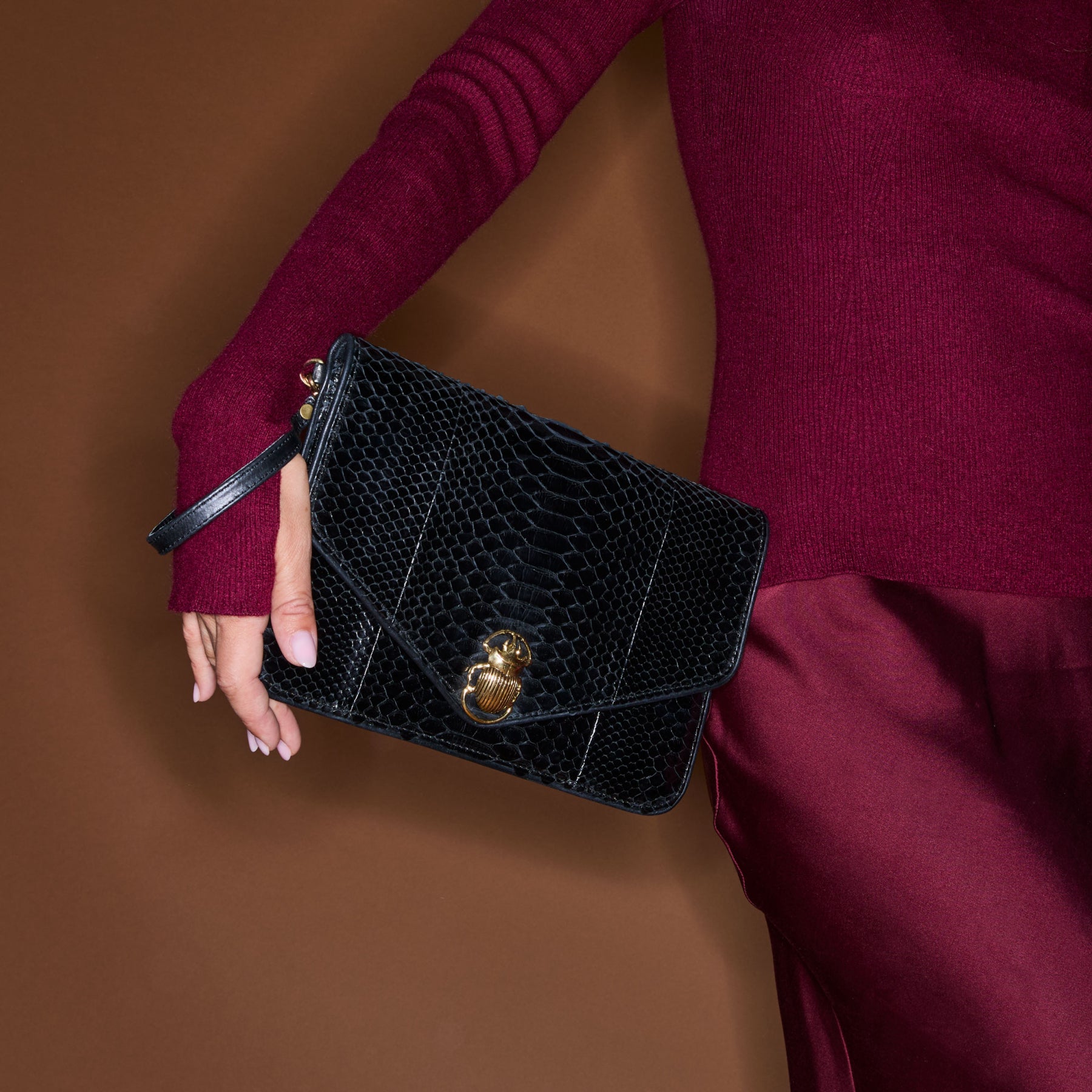 Clutch Alicia python negro